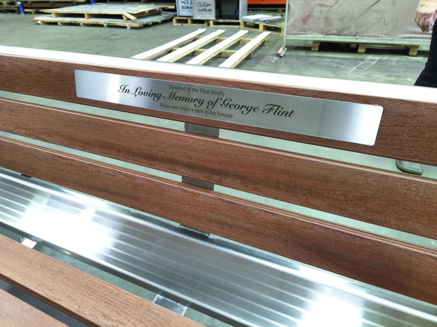 LASER ETCHED PLAQUE INLAYED IN UPPER SEAT PANEL 600MM X 60MM